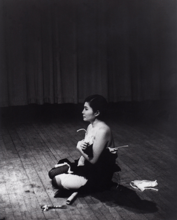 Cut Piece (1964) performed by Yoko Ono in New Works of Yoko Ono, Carnegie Recital Hall, New York, March 21, 1965. Photograph by Minoru Niizuma. © Minoru Niizuma. Courtesy Lenono Photo Archive, New York